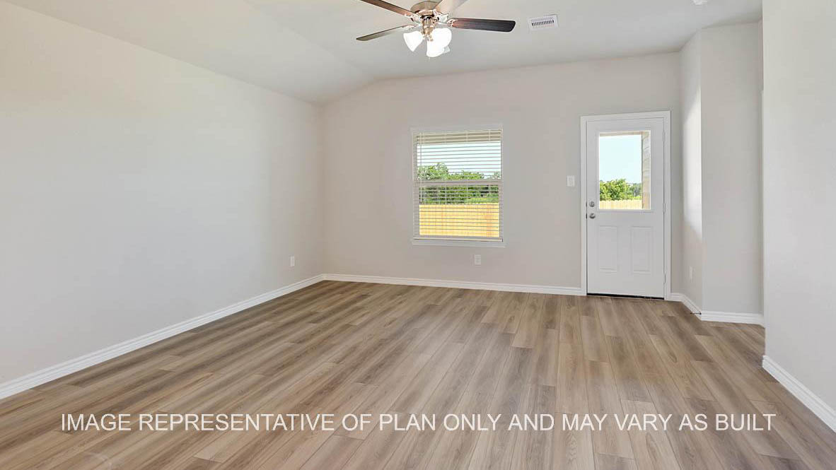 Richmond living room with view to back door and vinyl plank flooring.