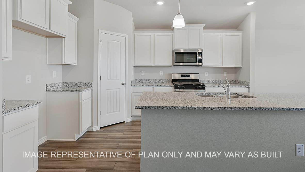 Prescott Kitchen with white cabinets, granite countertops, and vinyl plank flooring.