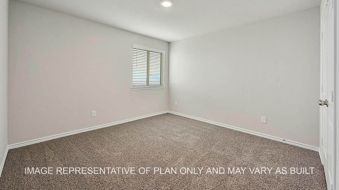 Sonoma secondary bedroom with window and carpet flooring.