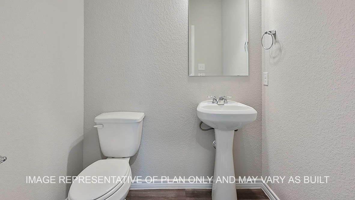 Sonoma powder bathroom with pedestal sink and vinyl plank flooring.