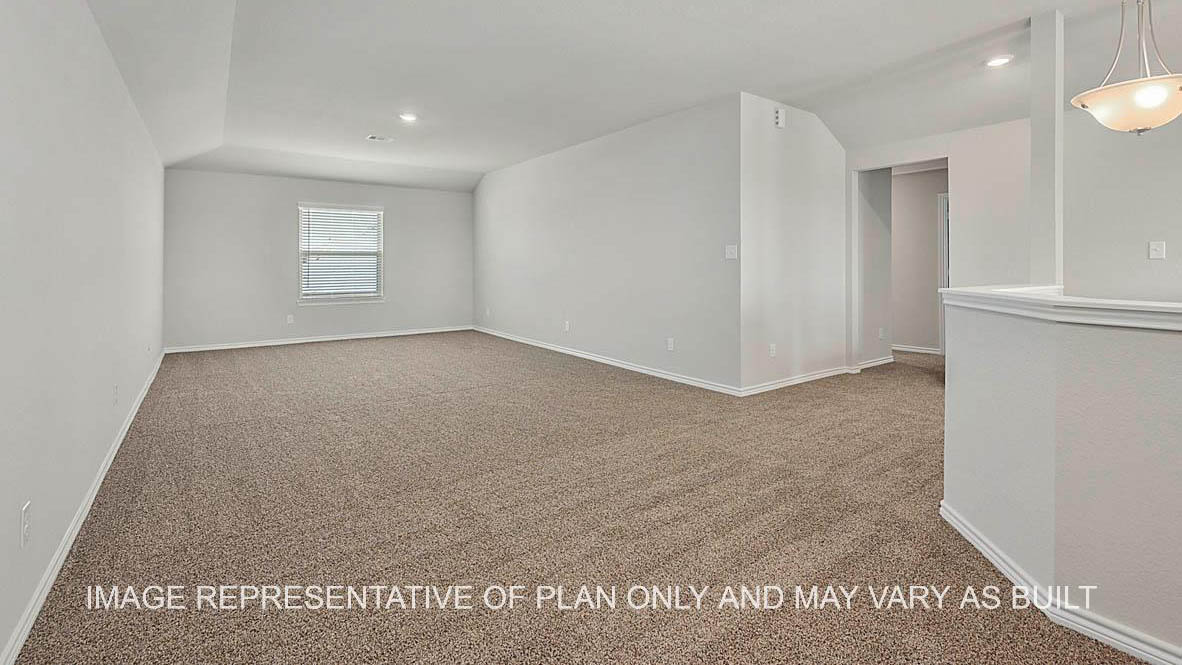 Sonoma gameroom with windows, view of staircase and carpet flooring.