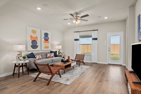 Southern Pointe model home open-concept living room with view to back door
