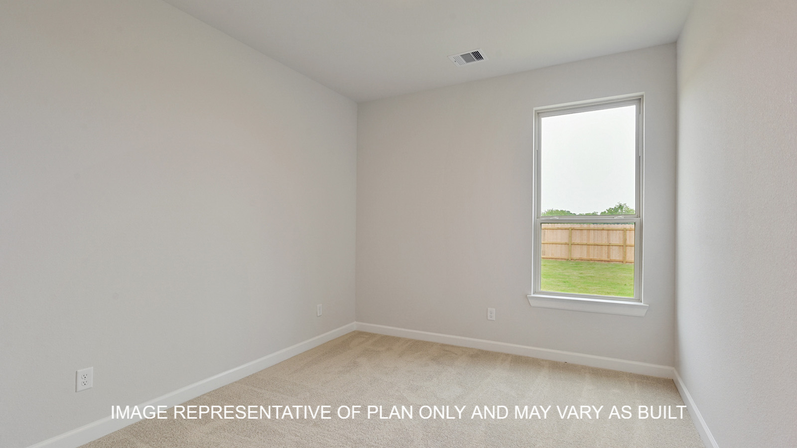 Brighton secondary bedroom with carpet and windows.