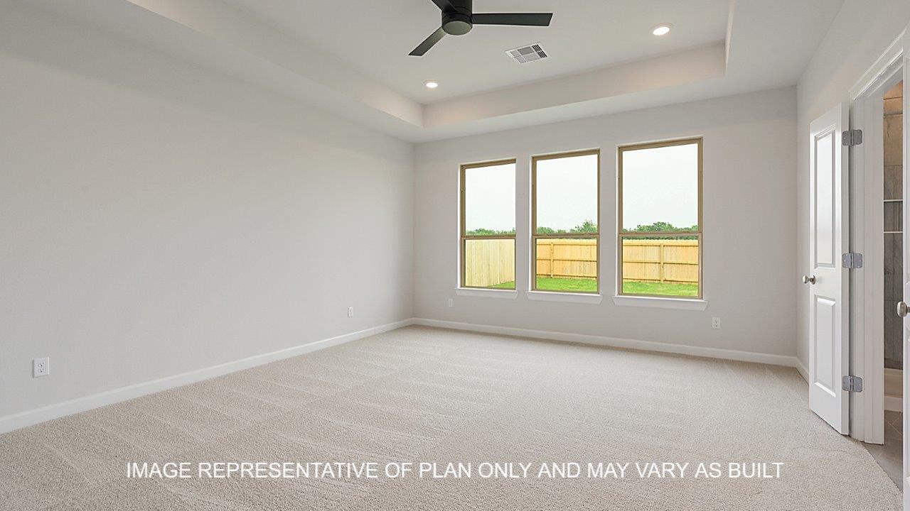 Oxford primary bedroom with carpet, windows and matte black ceiling fan.