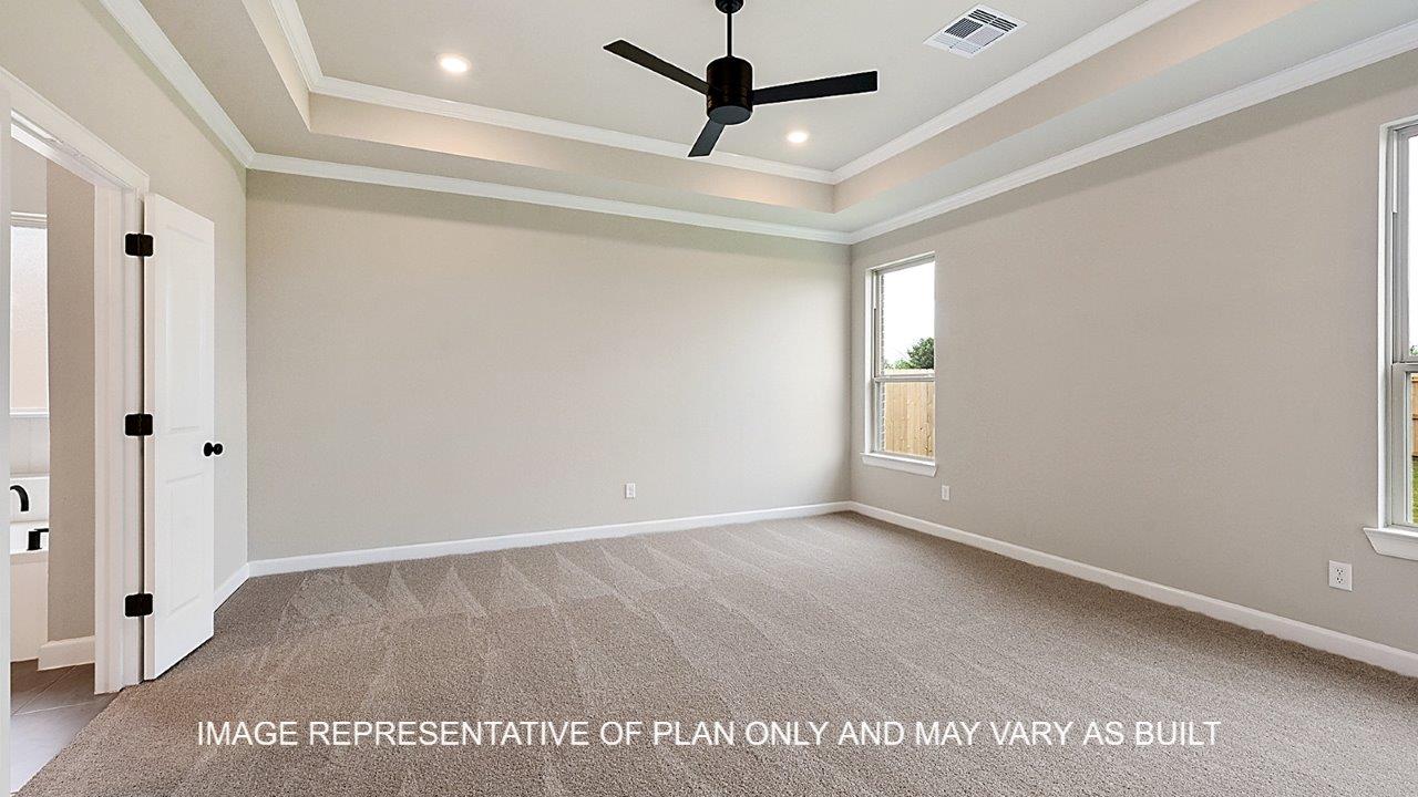 Stratford primary bedroom with carpet, windows and matte black ceiling fan.