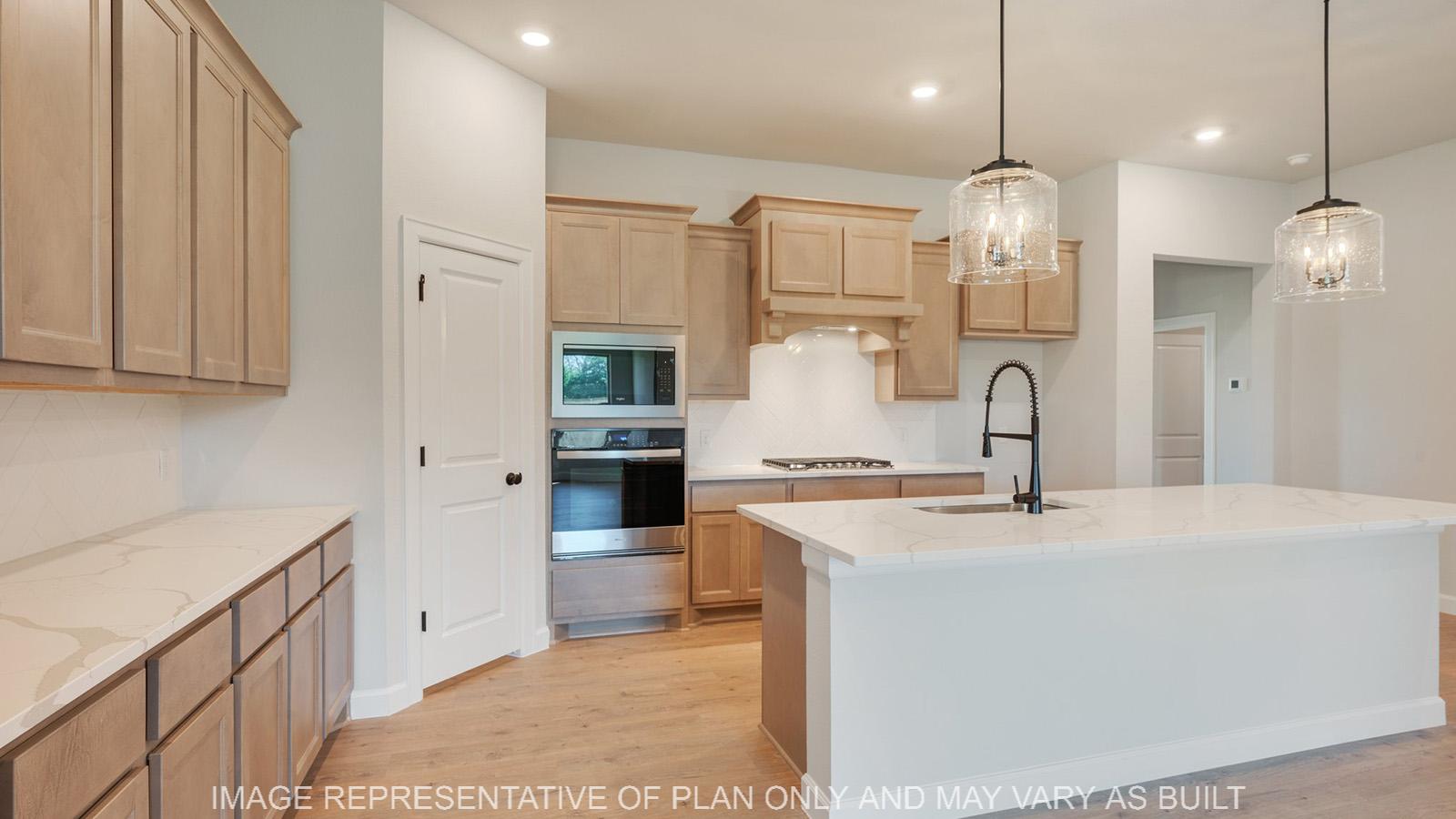 Weston kitchen with corner pantry and maple cabinetry.