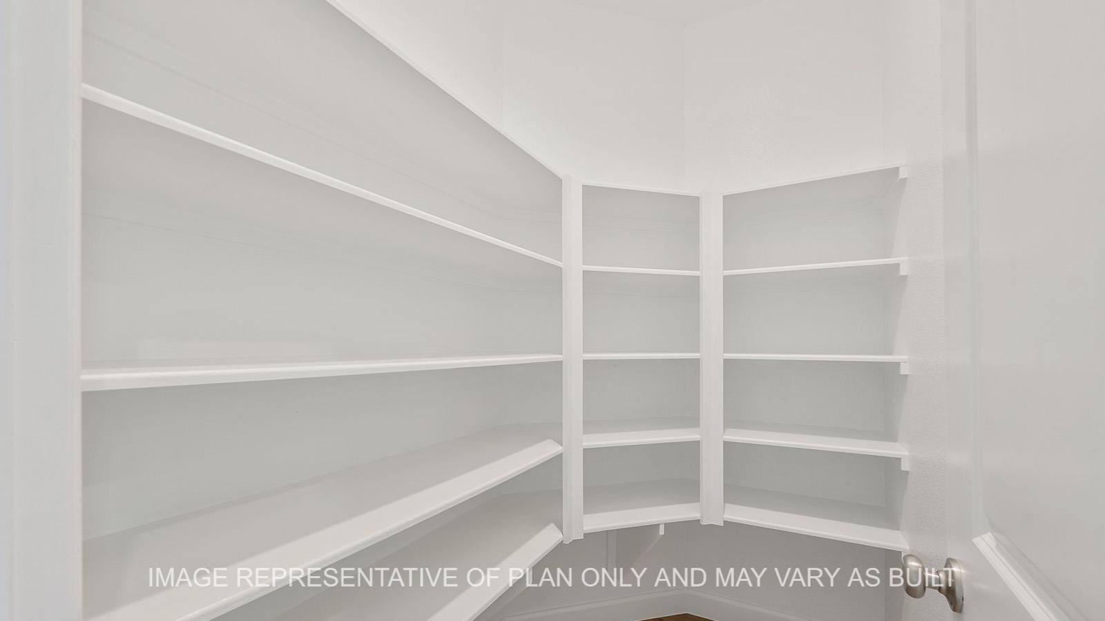 Hampton corner pantry with shelving.