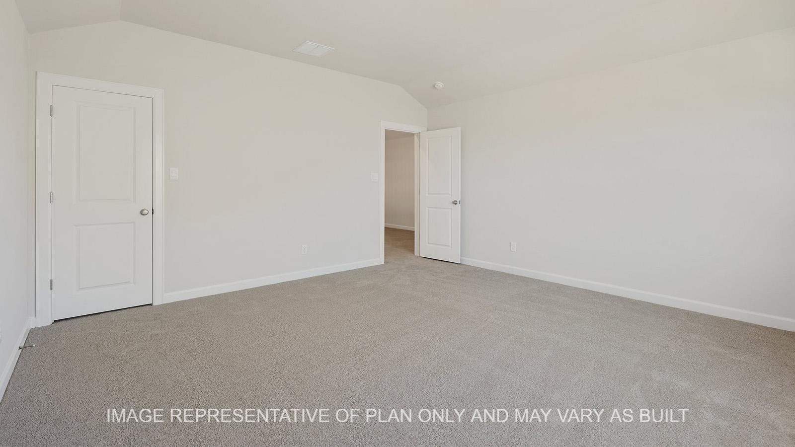 Hampton upstairs secondary bedroom with carpeted flooring and walk-in closet.