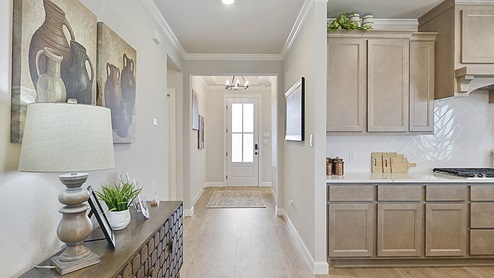 Spacious entry to kitchen.