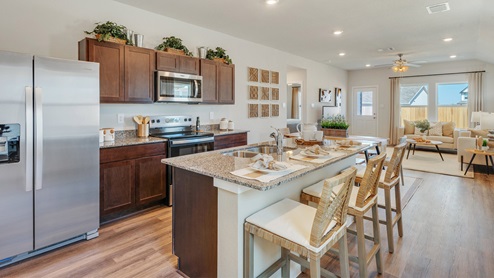 Cornerstone Caroline open concept living and kitchen areas.
