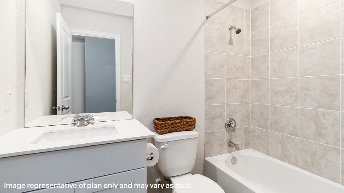 Atlanta secondary bathroom with single vanity and bath tub and shower combo.