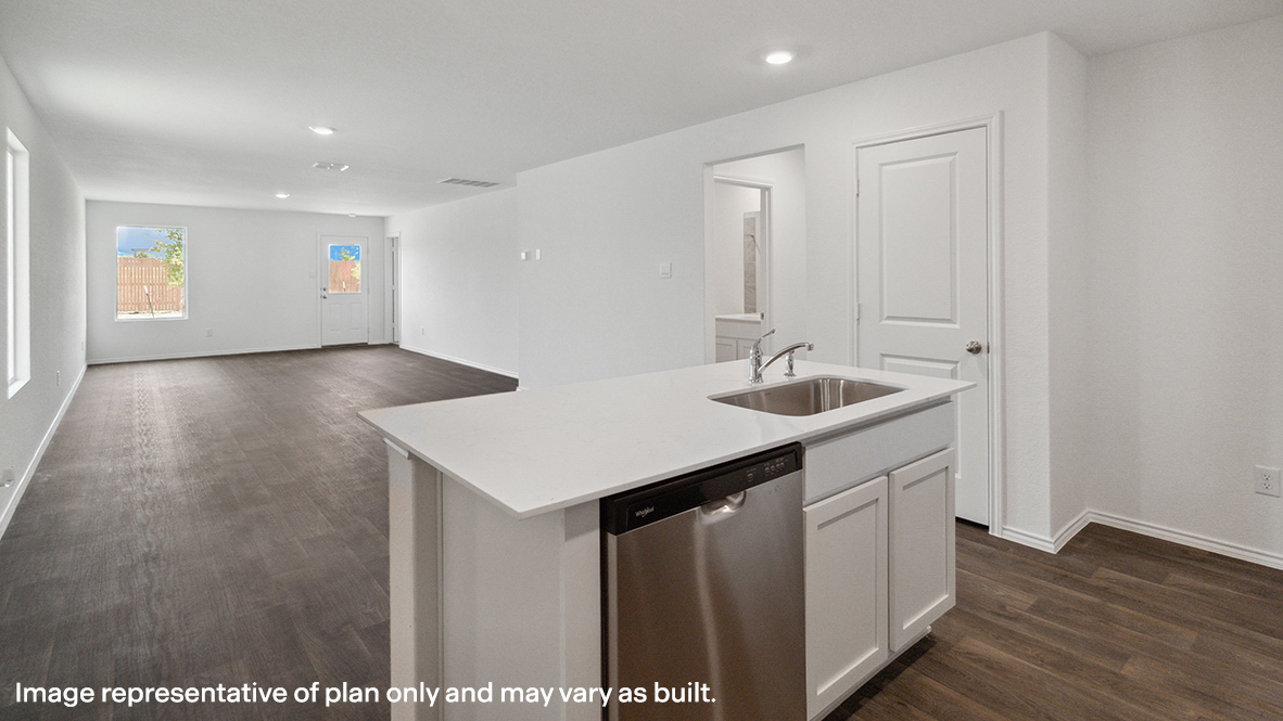 Caprock kitchen center kitchen island with view of dining room and living room.