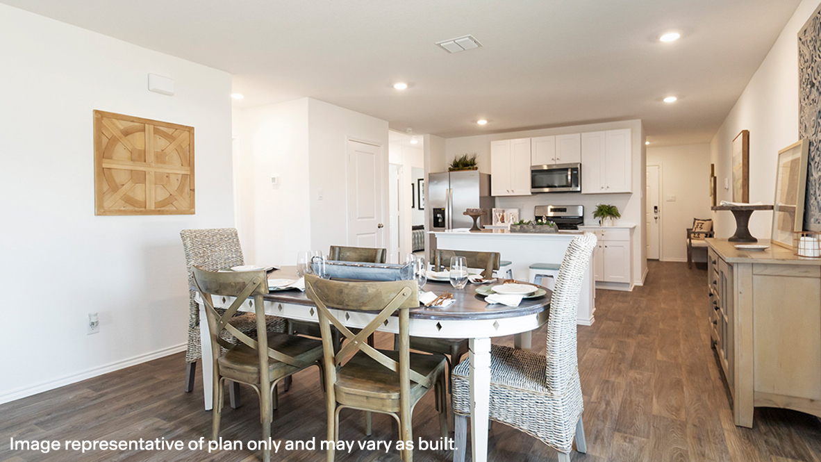 Estero dining room open concept with view of kitchen.