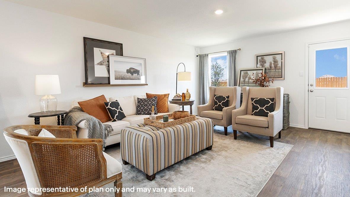 Estero living room with view of back door and back yard.