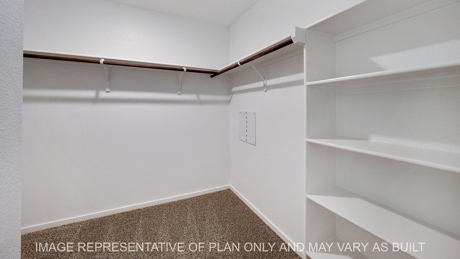 Brooke primary walk-in closet with built-in shelving.