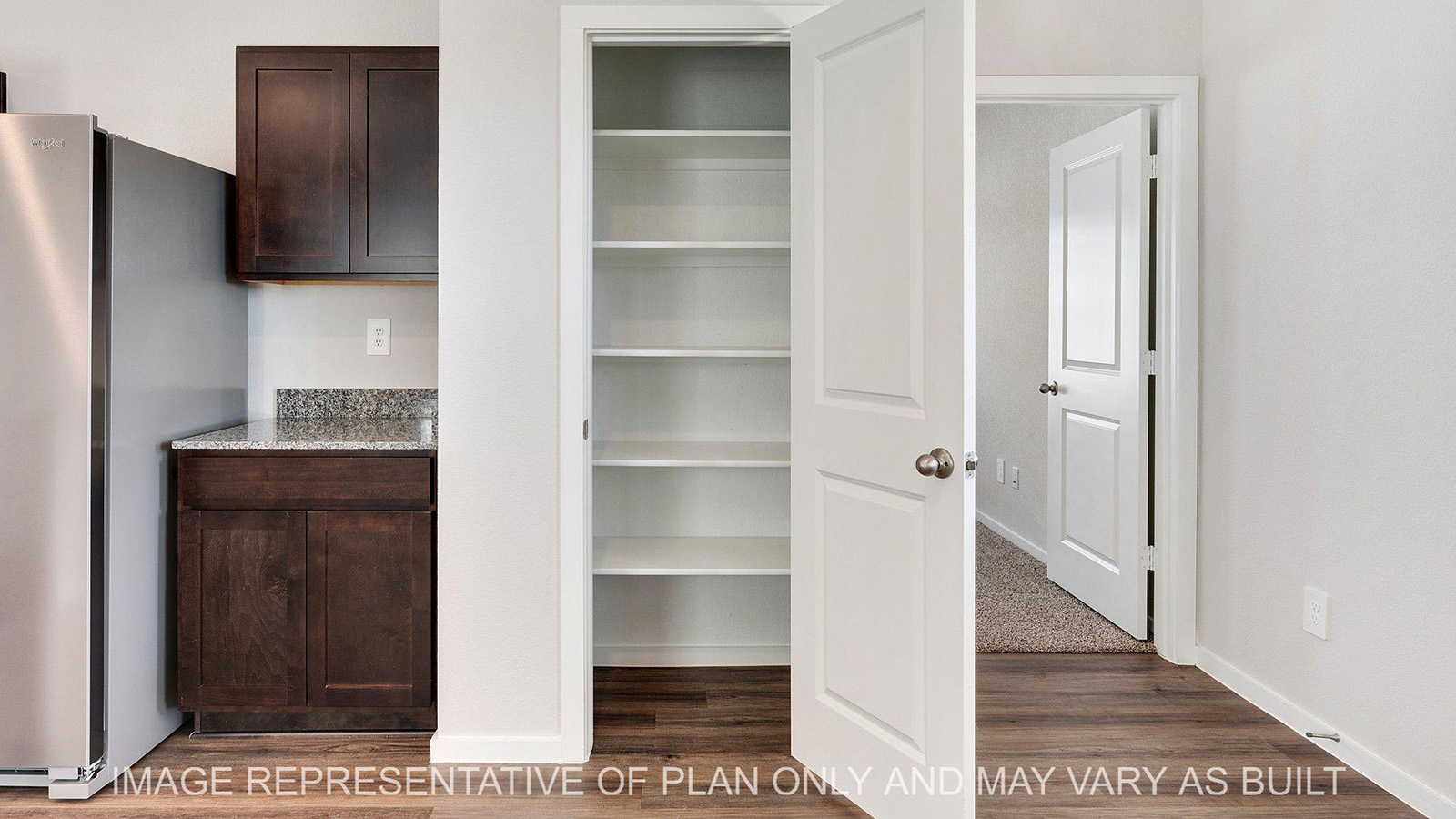Brooke kitchen pantry with shelving.