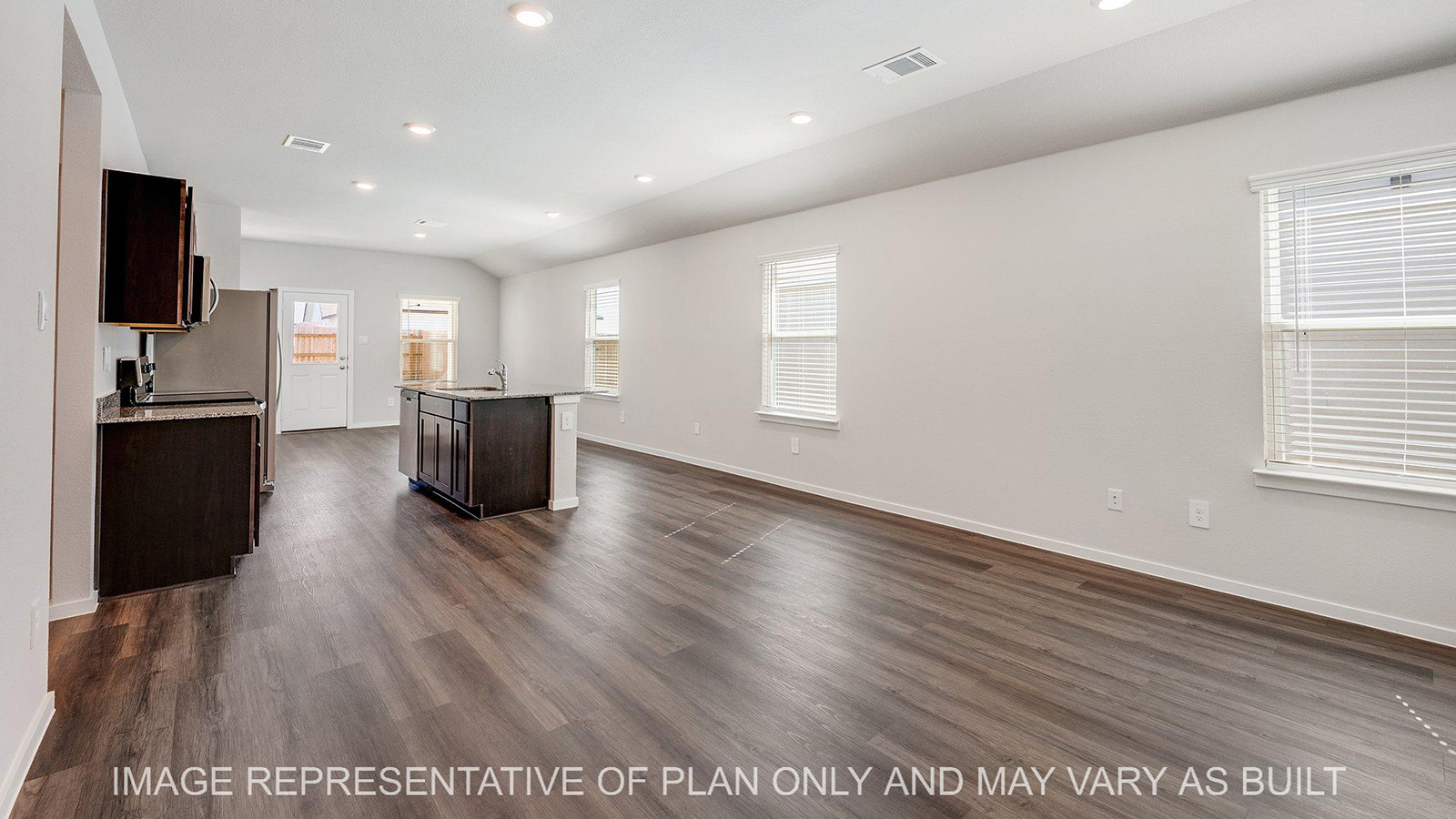 Brooke open-concept living area with view to kitchen.