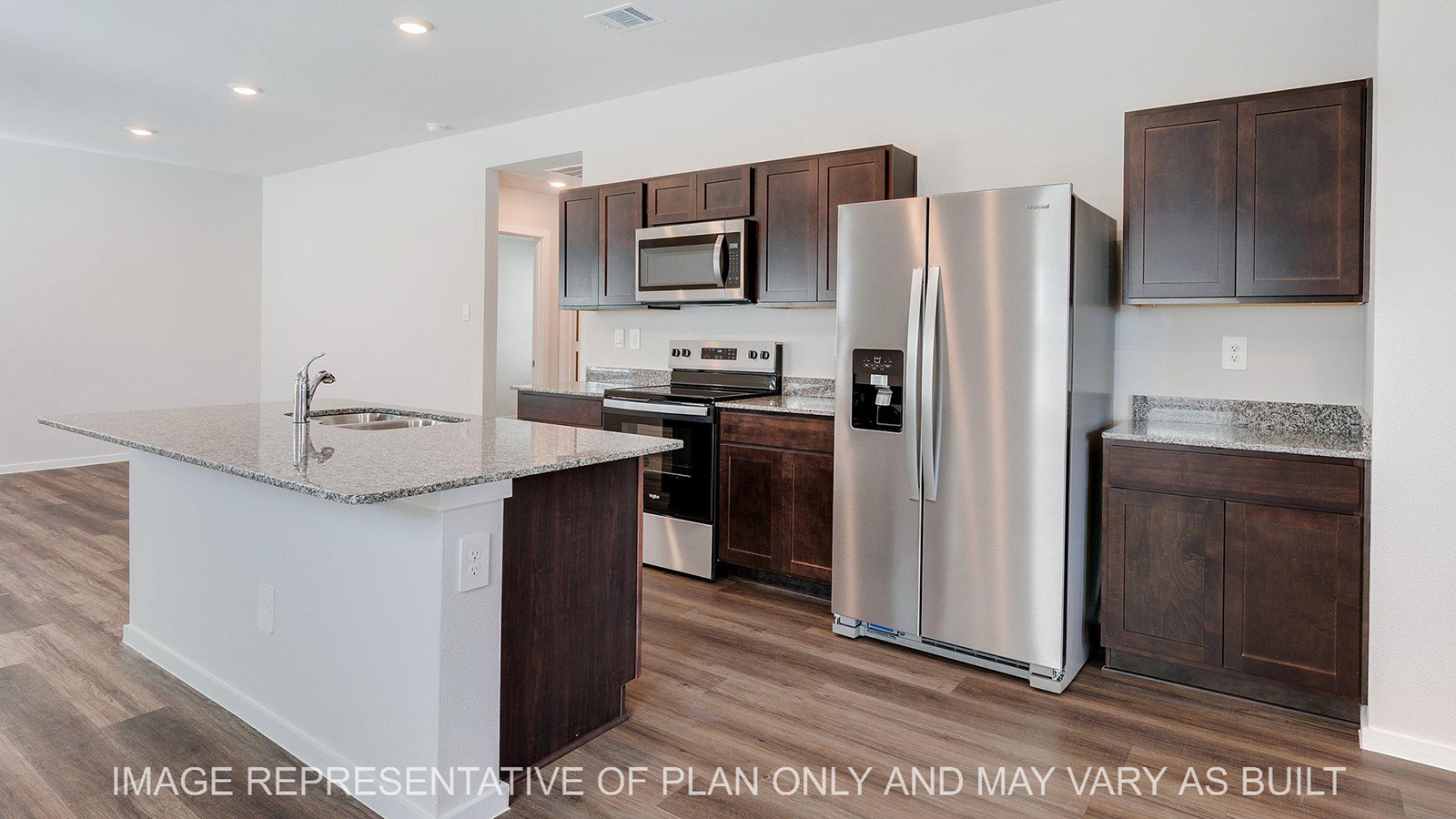 Brooke kitchen with stainless steel appliances and kitchen island.