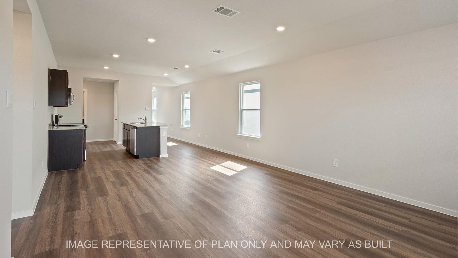 Caroline open concept living with view to kitchen.