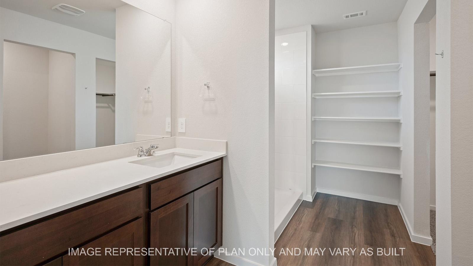 Caroline primary bathroom with built in shelving.