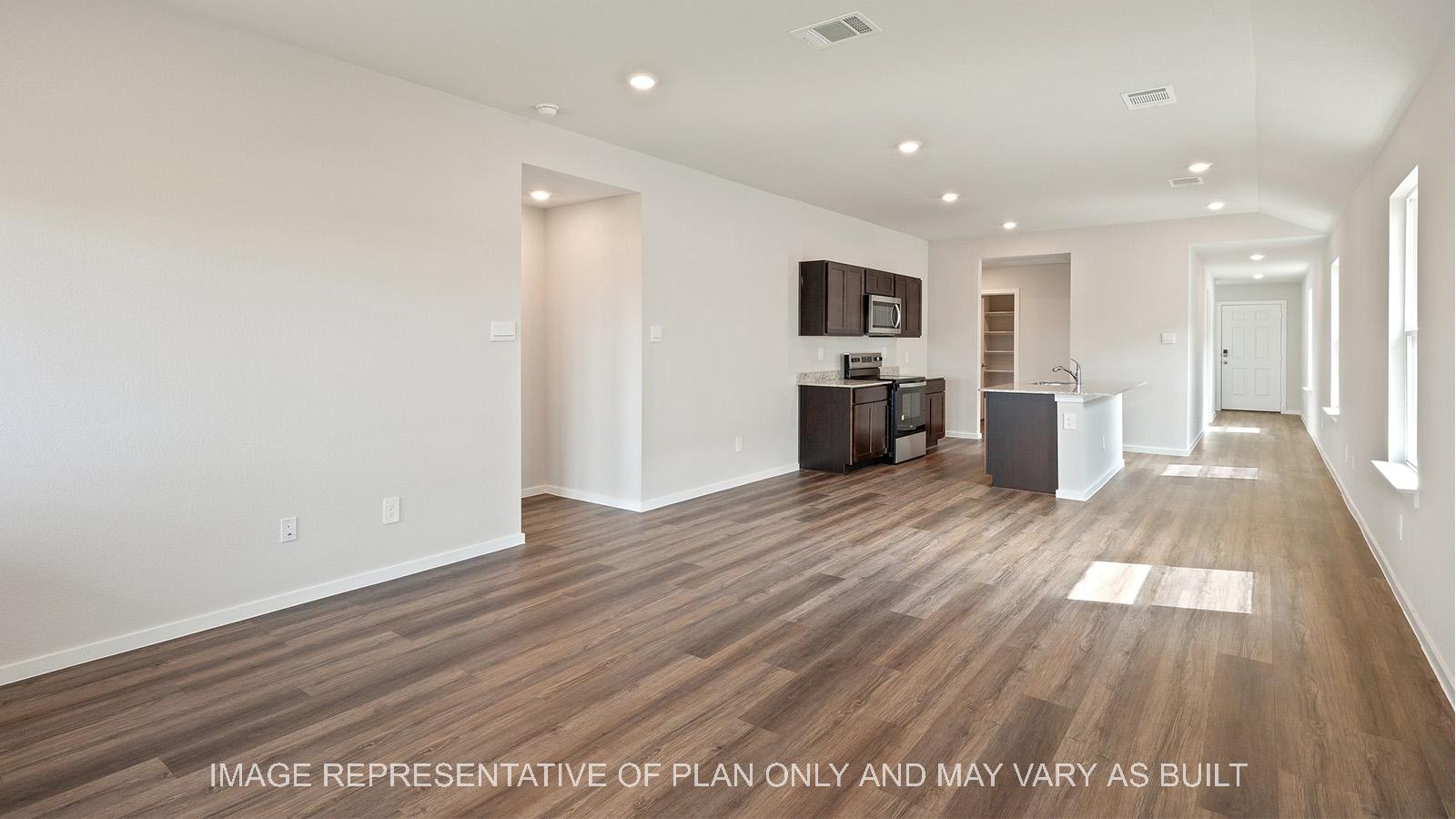 Caroline open concept living with view to kitchen.