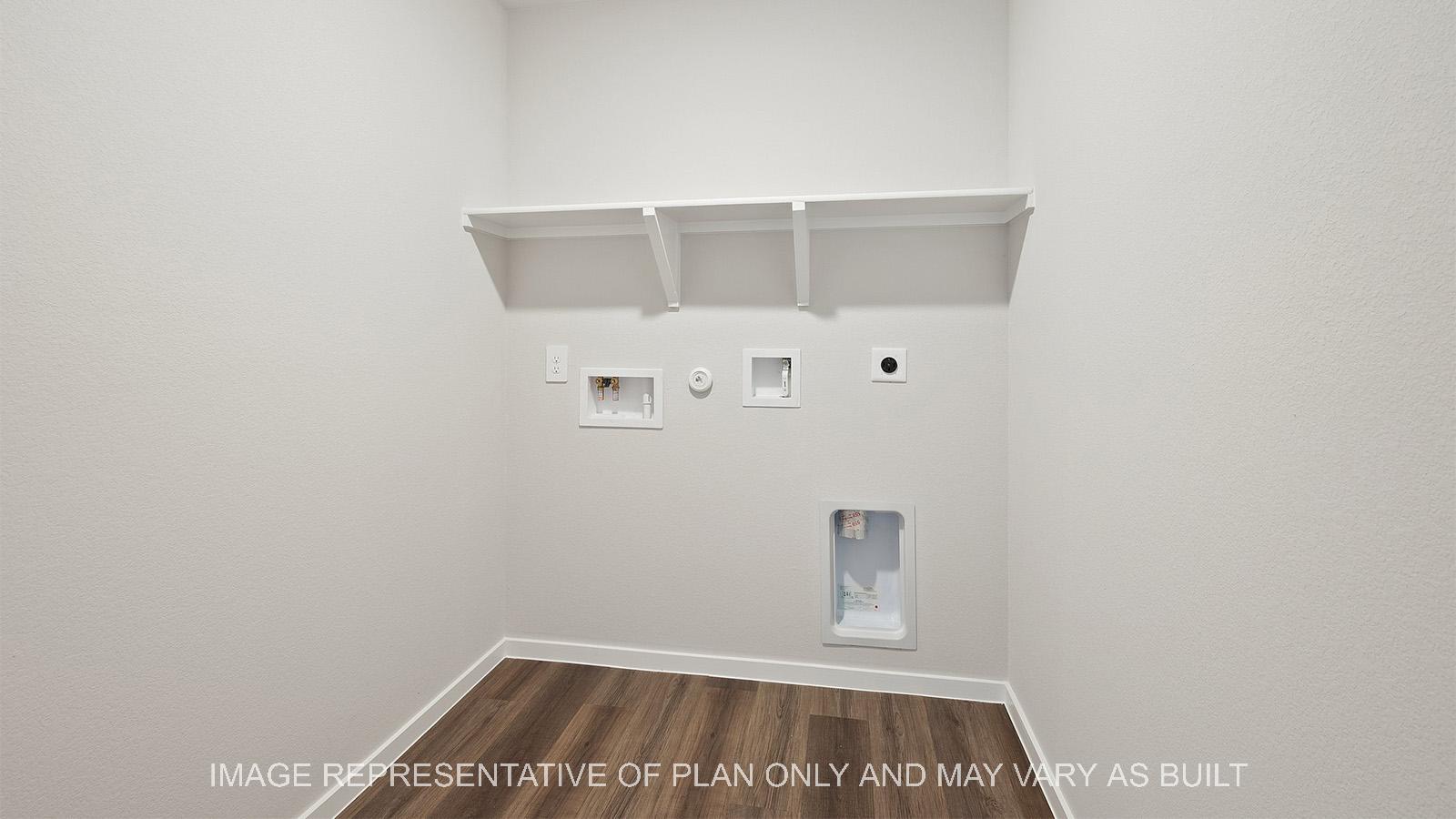 Lakeway utility room with vinyl plank flooring and laundry hookups.