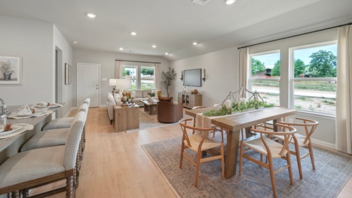 Wilkins Valley open concept dining area with western, farmhouse interior