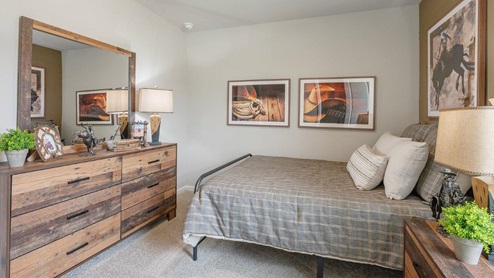 Wilkins Valley secondary bedroom with little cowboy decor and carpeted flooring