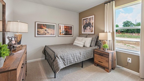 Wilkins Valley secondary bedroom with little cowboy decor and carpeted flooring