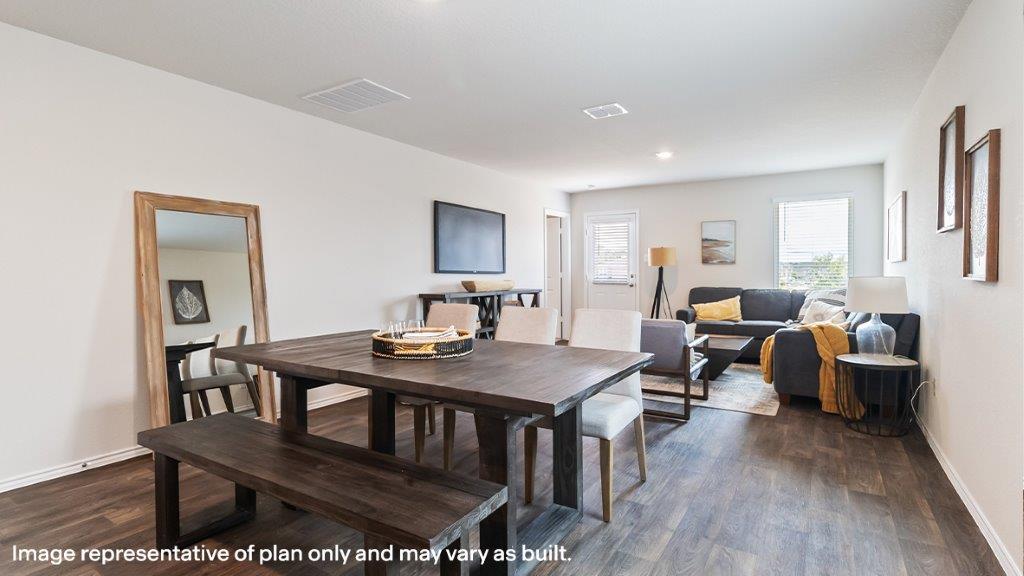 Barton dining room open concept with view of living room.