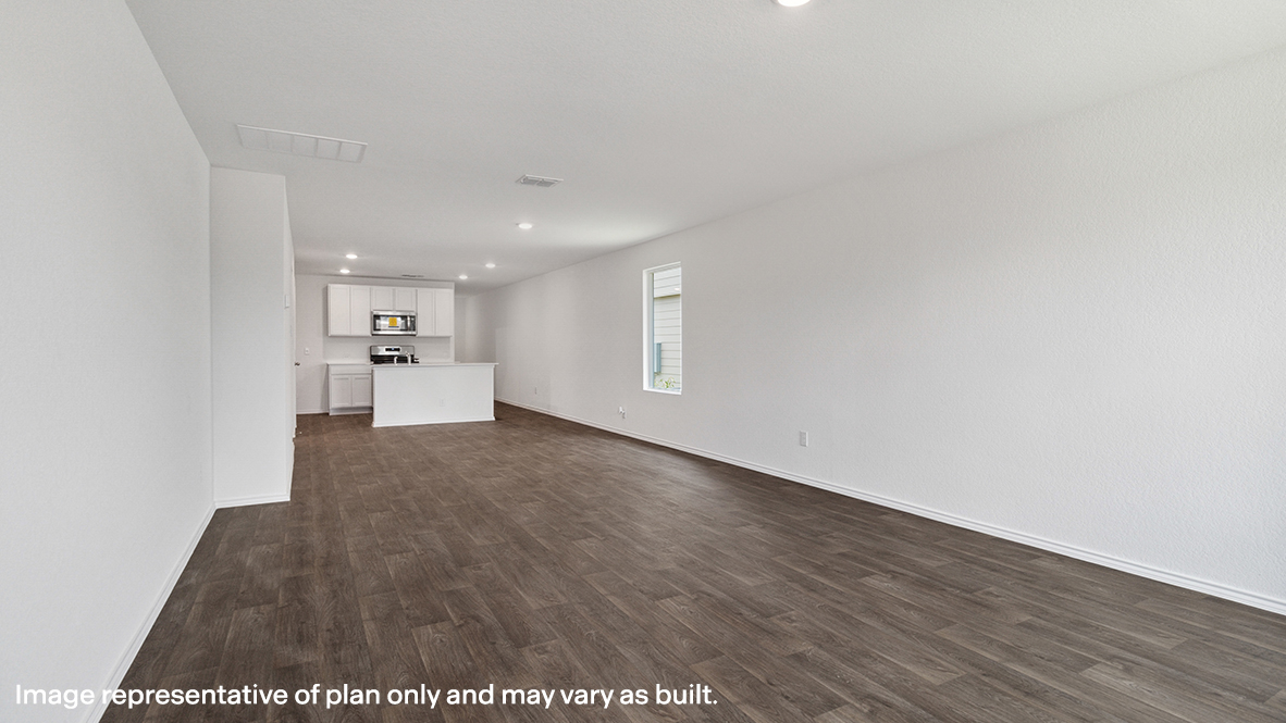 Caprock living room open concept with view of dining room and kitchen.