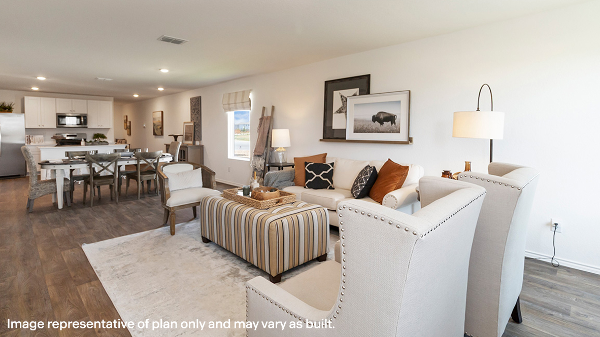 Estero living room open concept with view of dining room and kitchen.