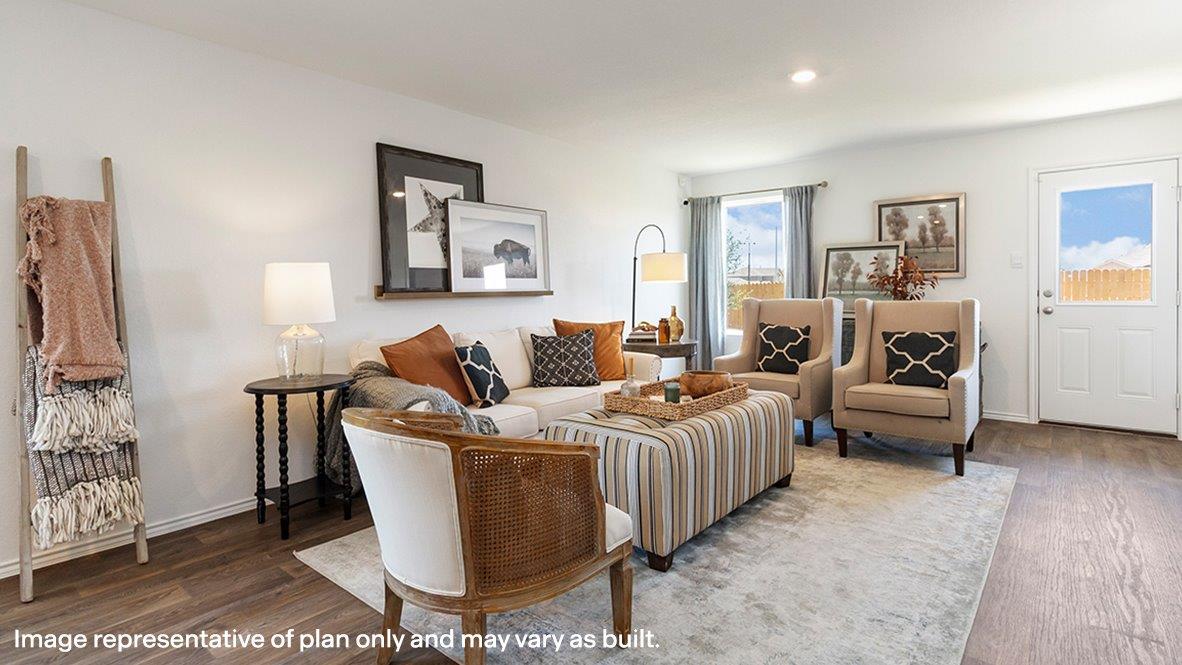 Estero living room with view of back door and back yard.
