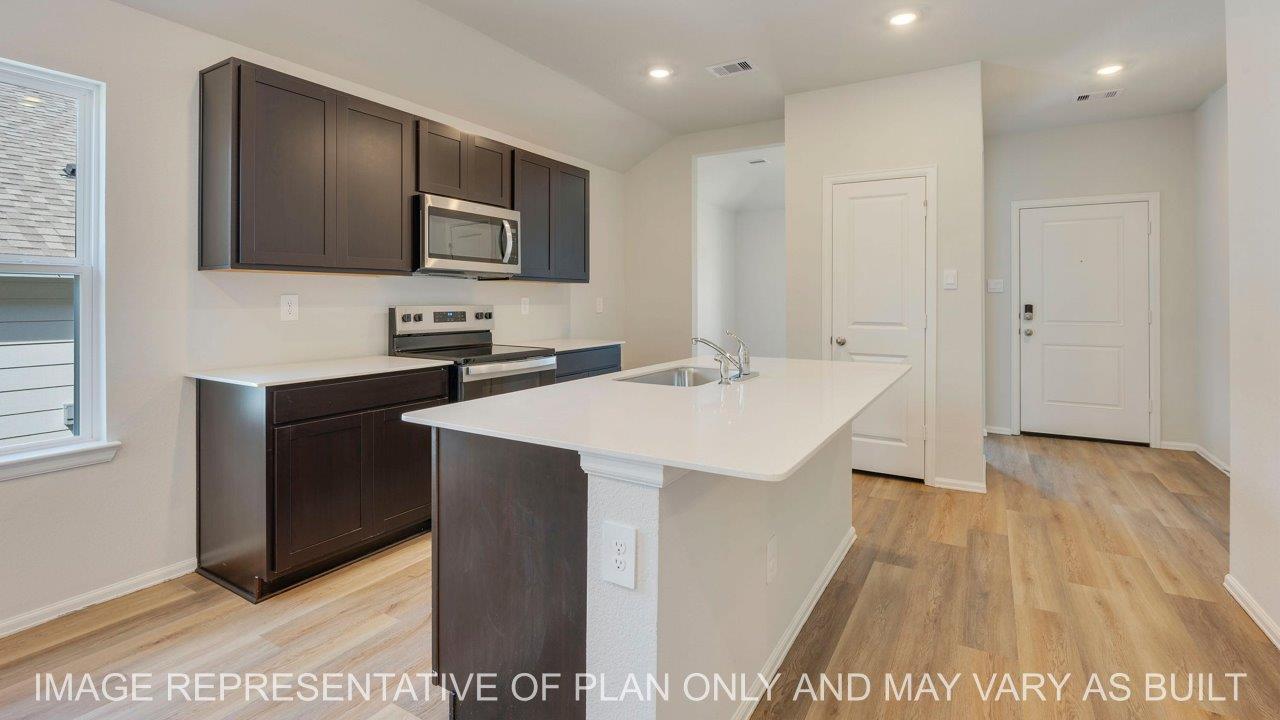 Abbot open concept kitchen with view to dining