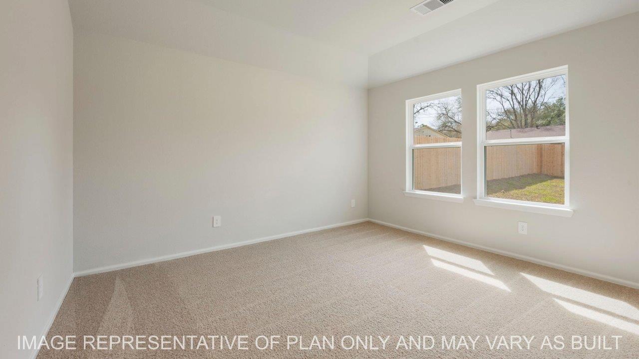Abbot primary bedroom with carpet and windows