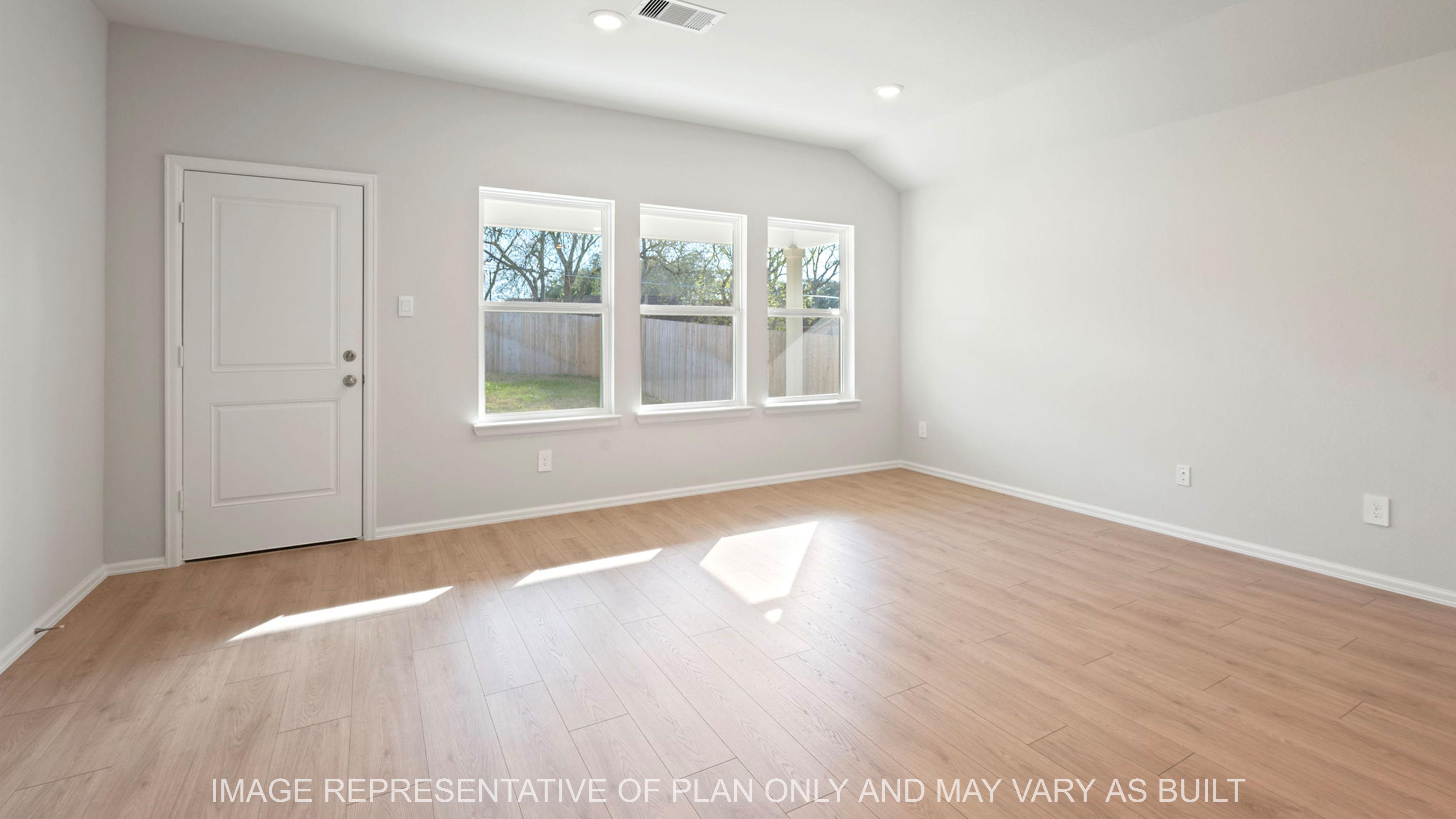 Easton open concept living area with light wood vinyl flooring