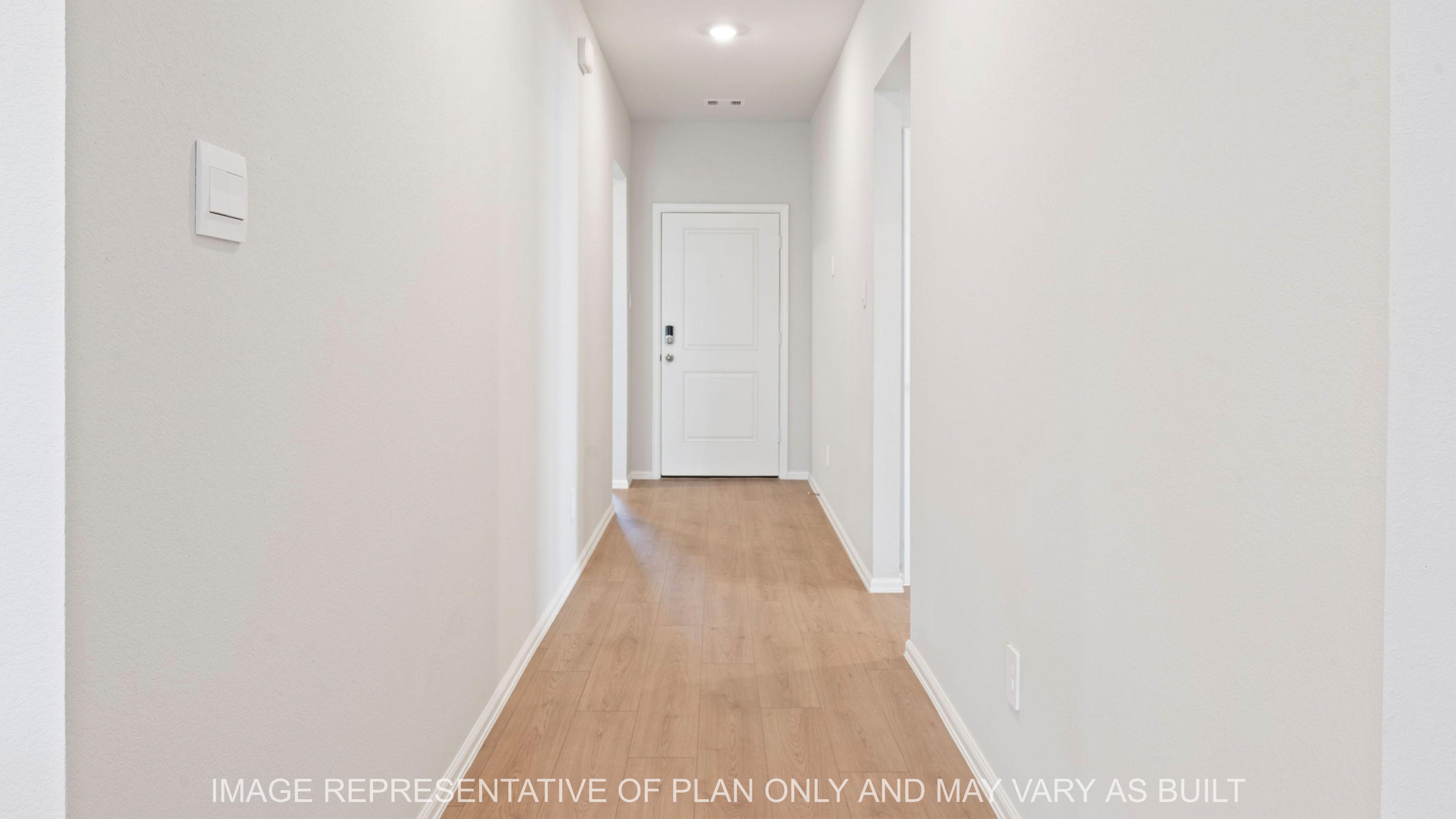Easton entry way with light wood vinyl flooring