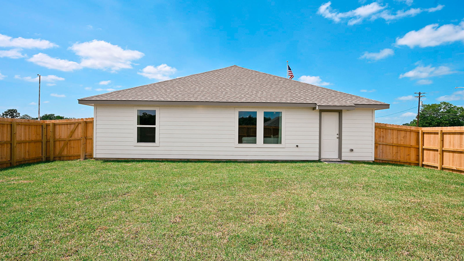 Whitetail Run Model Home backyard exterior