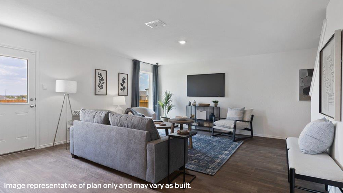 Franklin living room with vinyl plank flooring and window for lighting.
