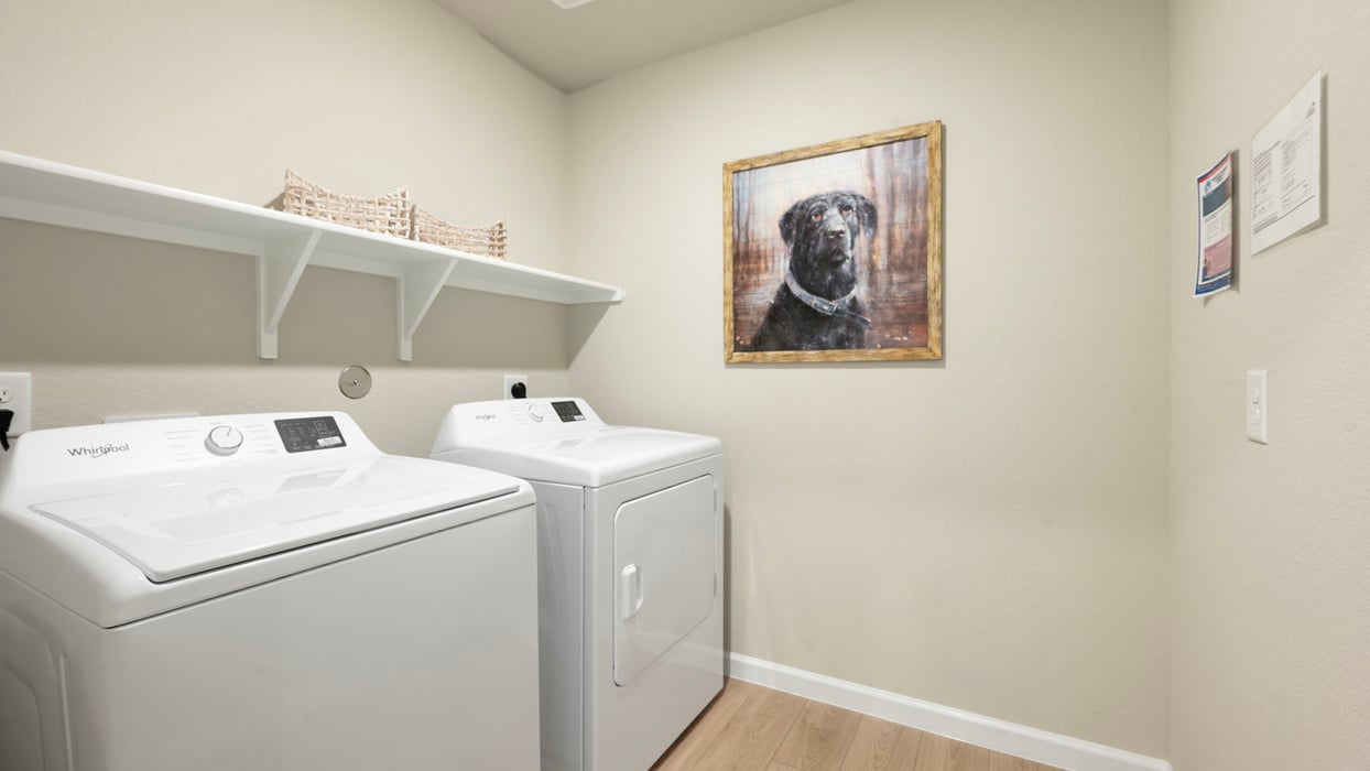 Grand Lake Model Home utility room with vinyl plank flooring