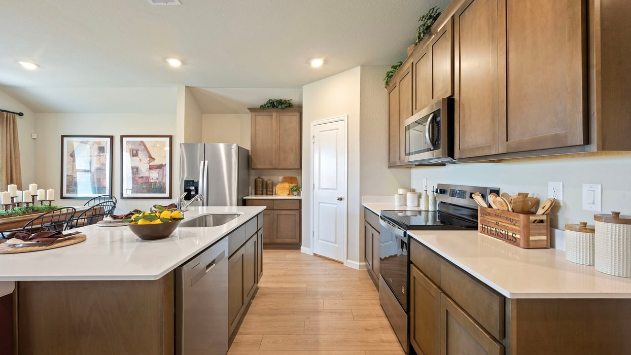 Grand Lake Model Home open concept kitchen with dark stain