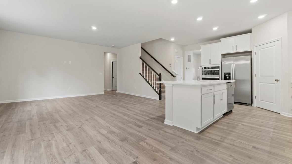 The kitchen island overlooks the great room