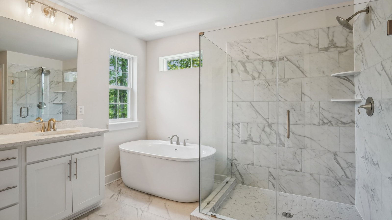primary bath features a soaking tub and shower