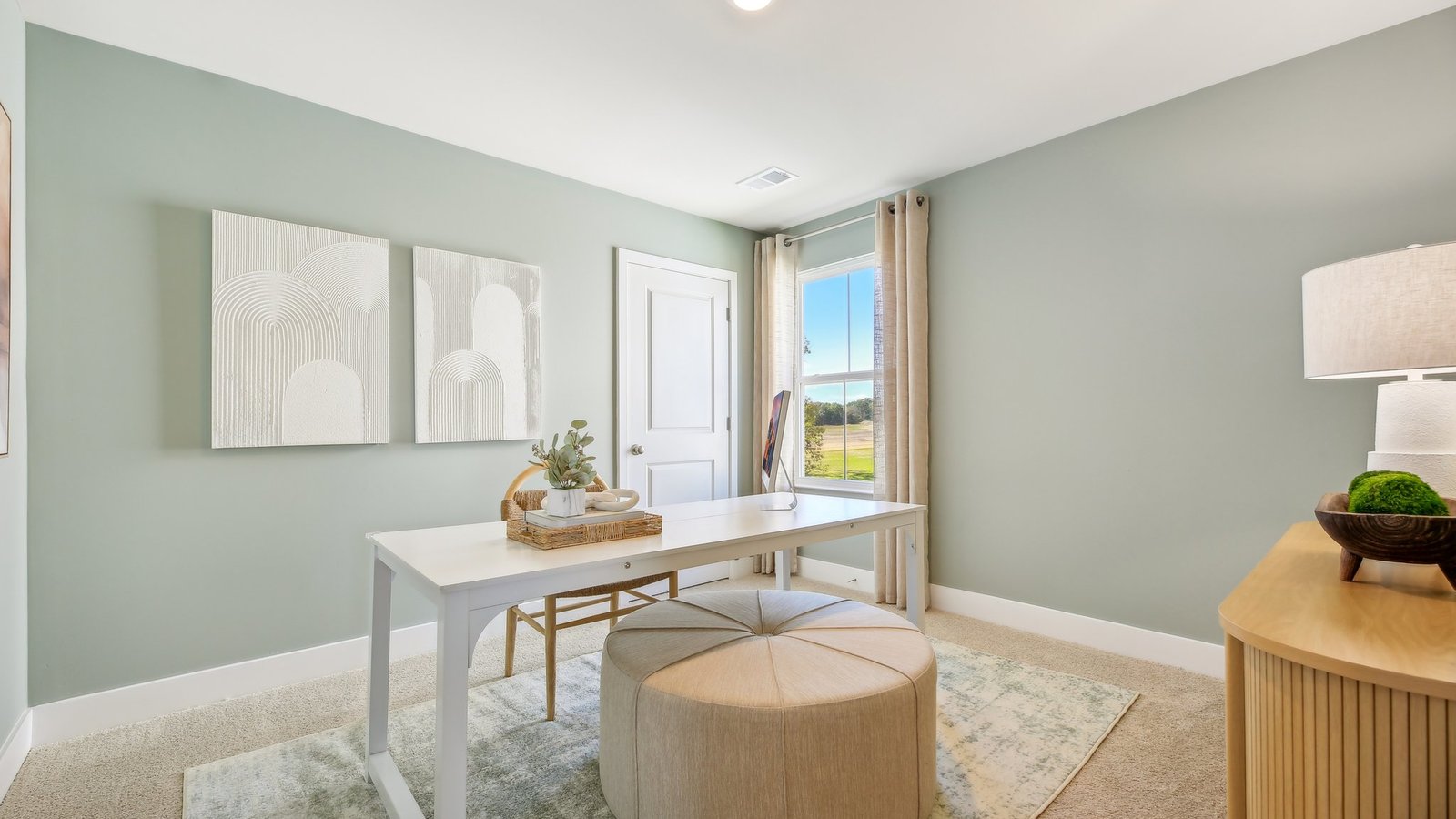 One of the secondary bedrooms has been set up as a home office