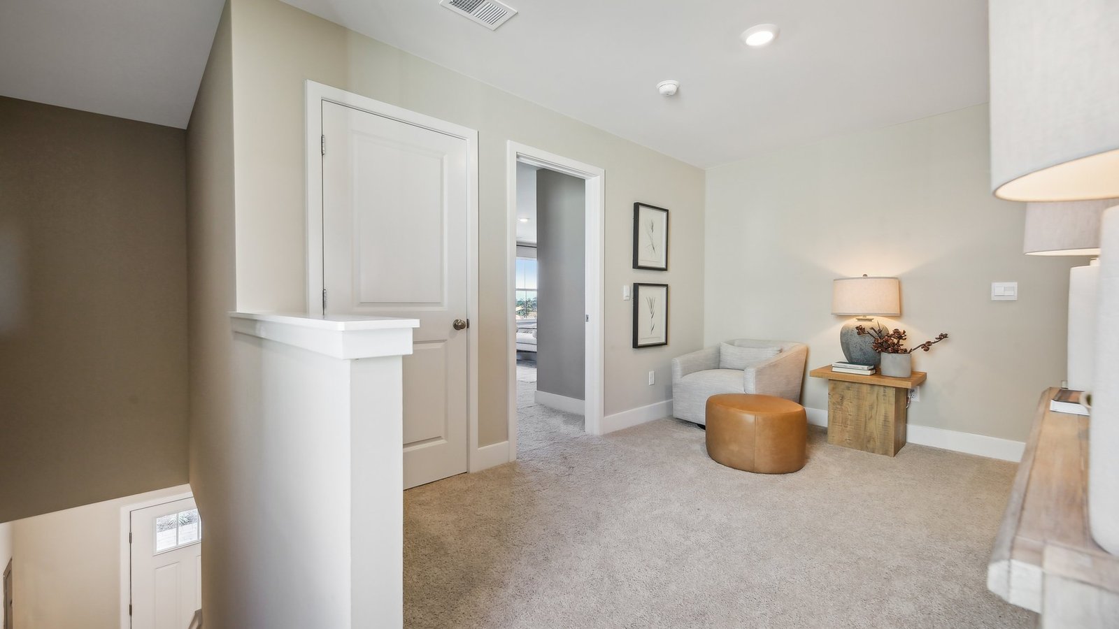 Flexible loft space in a new Winchester VA home ideal for a home office, media room, or play area.