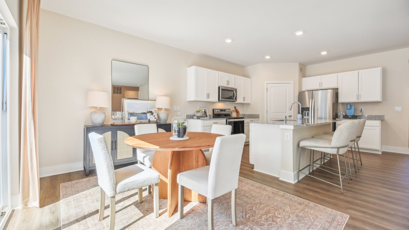 The L-shaped kitchen has a large walk-in pant