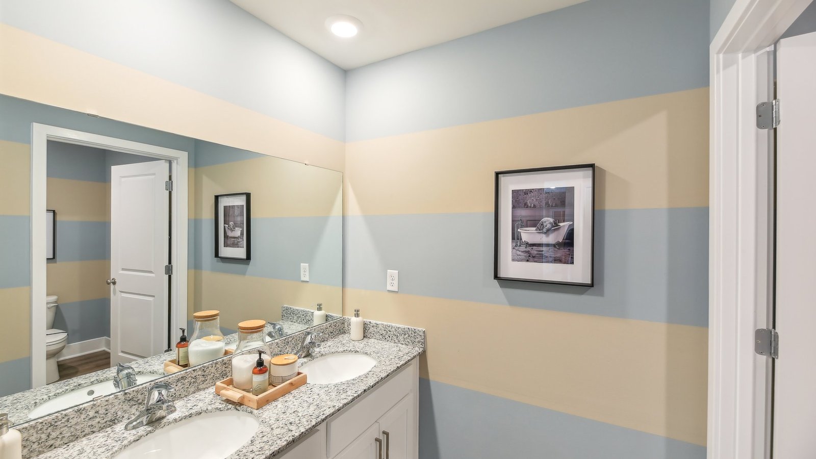 secondary full bathroom with double sink vanity