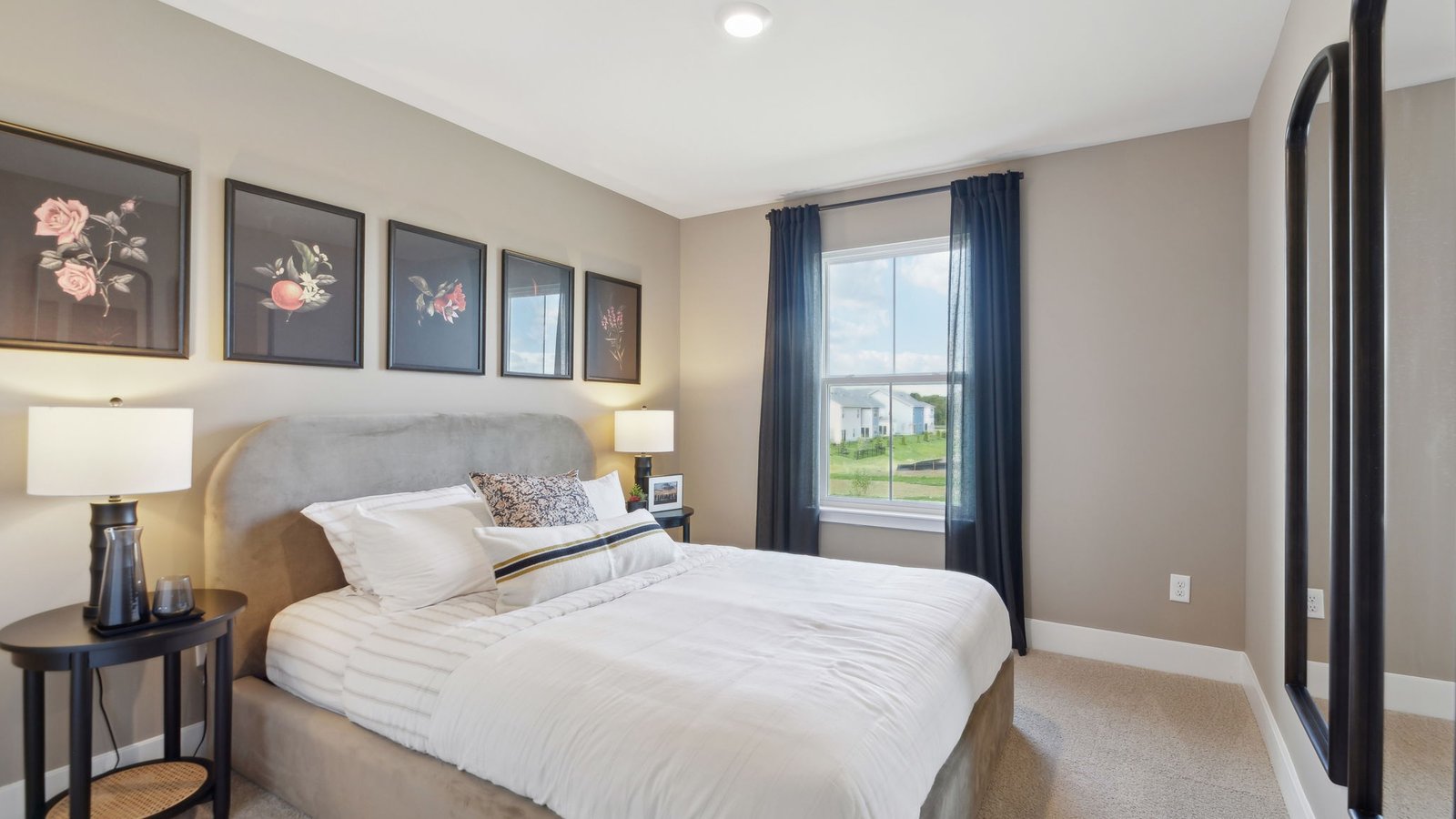 Comfortable secondary bedroom in a new construction single-family home in Winchester, VA with versatile space for family members or guests.