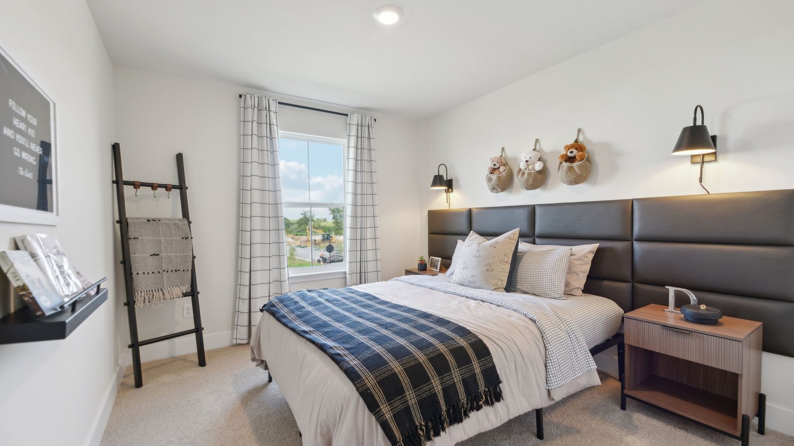 Comfortable secondary bedroom in a new construction single-family home in Winchester, VA with versatile space for family members or guests.
