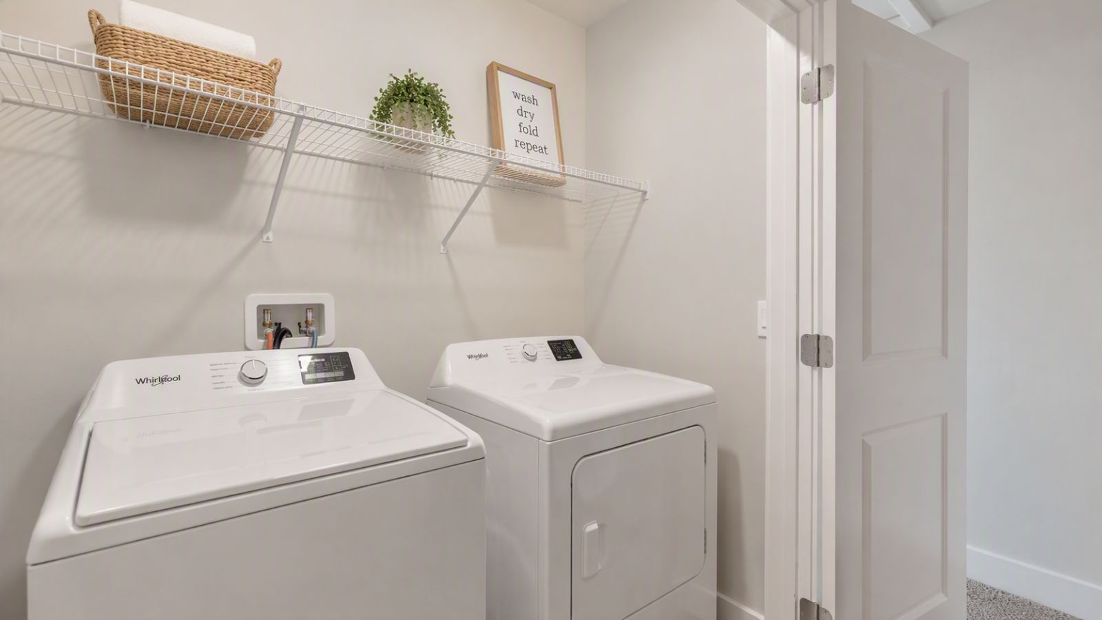 laundry room with storage